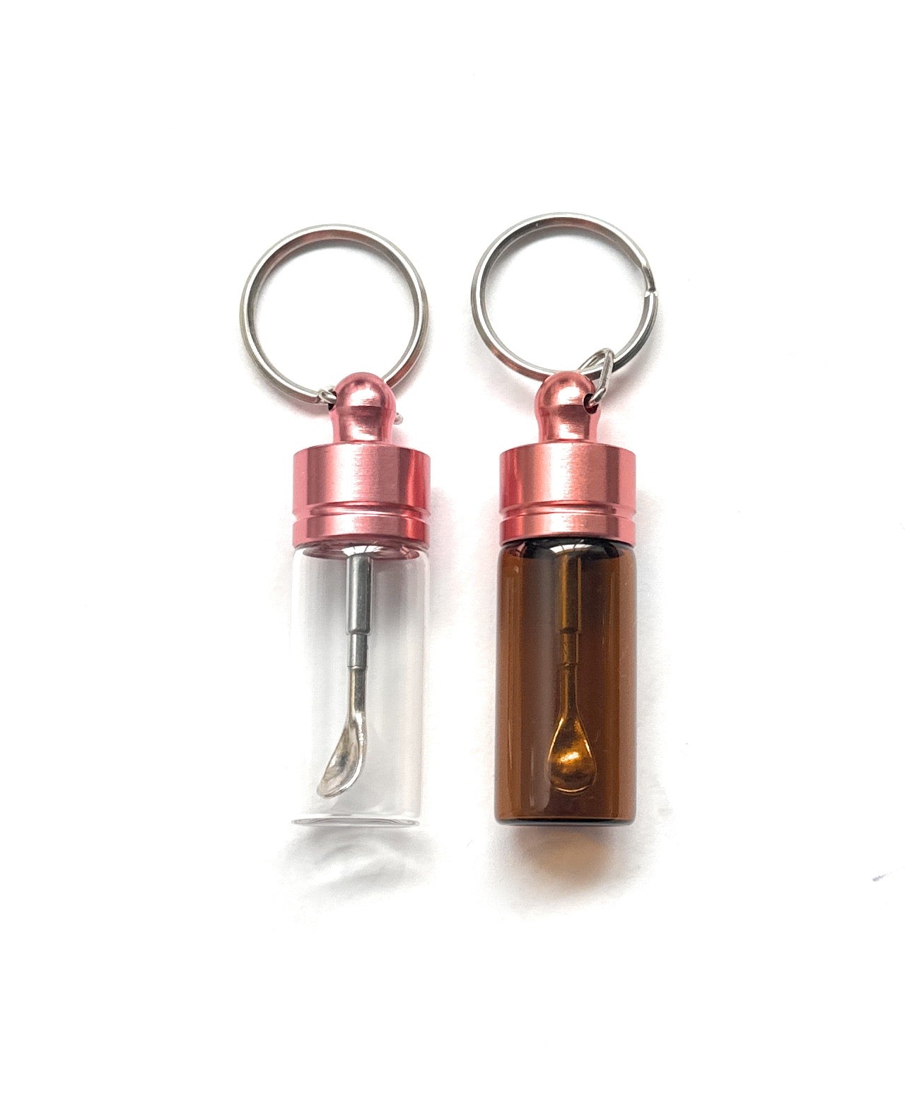 Stable dispenser with telescopic spoon – keychain in pink