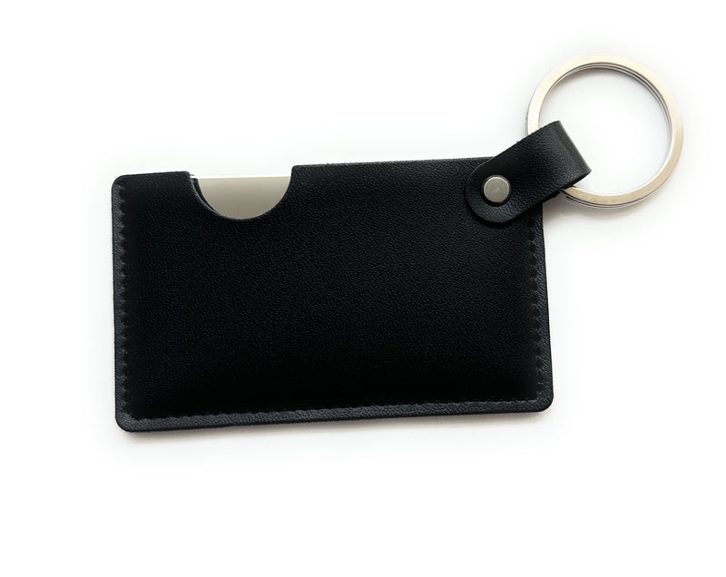 Mirror to-go in a black protective case with a key ring that can be folded out - the perfect base for on the go